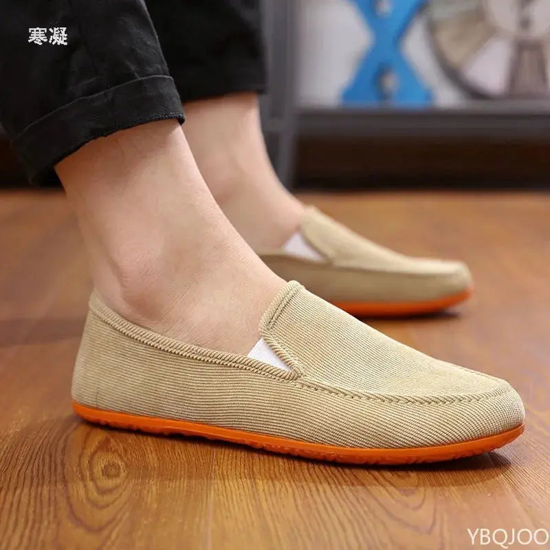 Men's beige fabric slip-on loafers with orange sole for casual wear