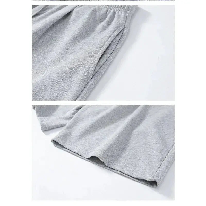 Men's gray cotton shorts with elastic waistband for casual fitness wear.