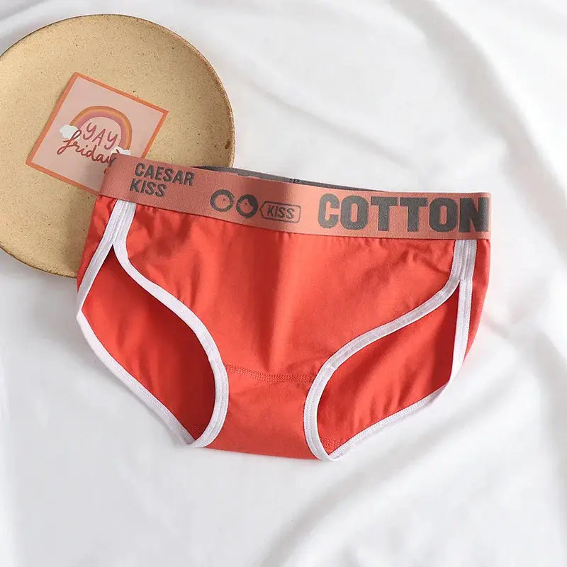 Women's red cotton briefs with white trim; waistband shows Caesar Kiss branding, 1 pair.