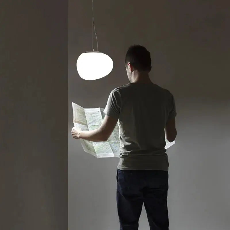 Nordic white glass ball pendant light by Simples Market for bedroom or dining.