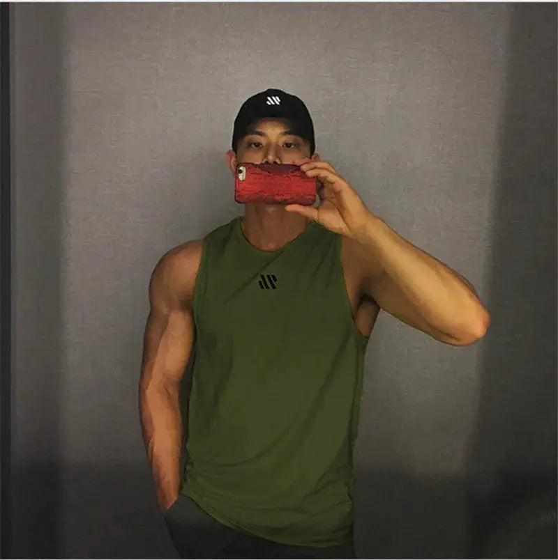 Men's olive green sleeveless bodybuilding stringer tank top with Simples Market logo