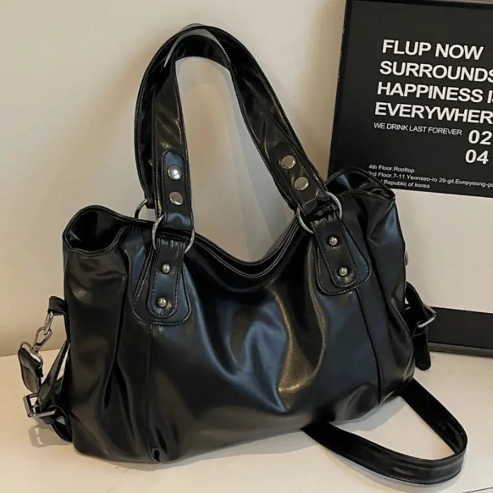 Roomy black PU leather shoulder bag with double top handles and a detachable shoulder strap