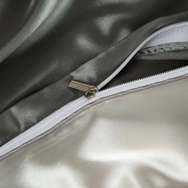 Silk bedding set by Simples Market with zipper closure; gray and ivory satin duvet cover, fitted and flat sheets