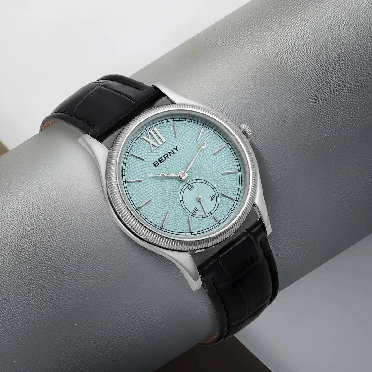 BERNY men's wristwatch with light blue textured dial, silver case, black leather strap