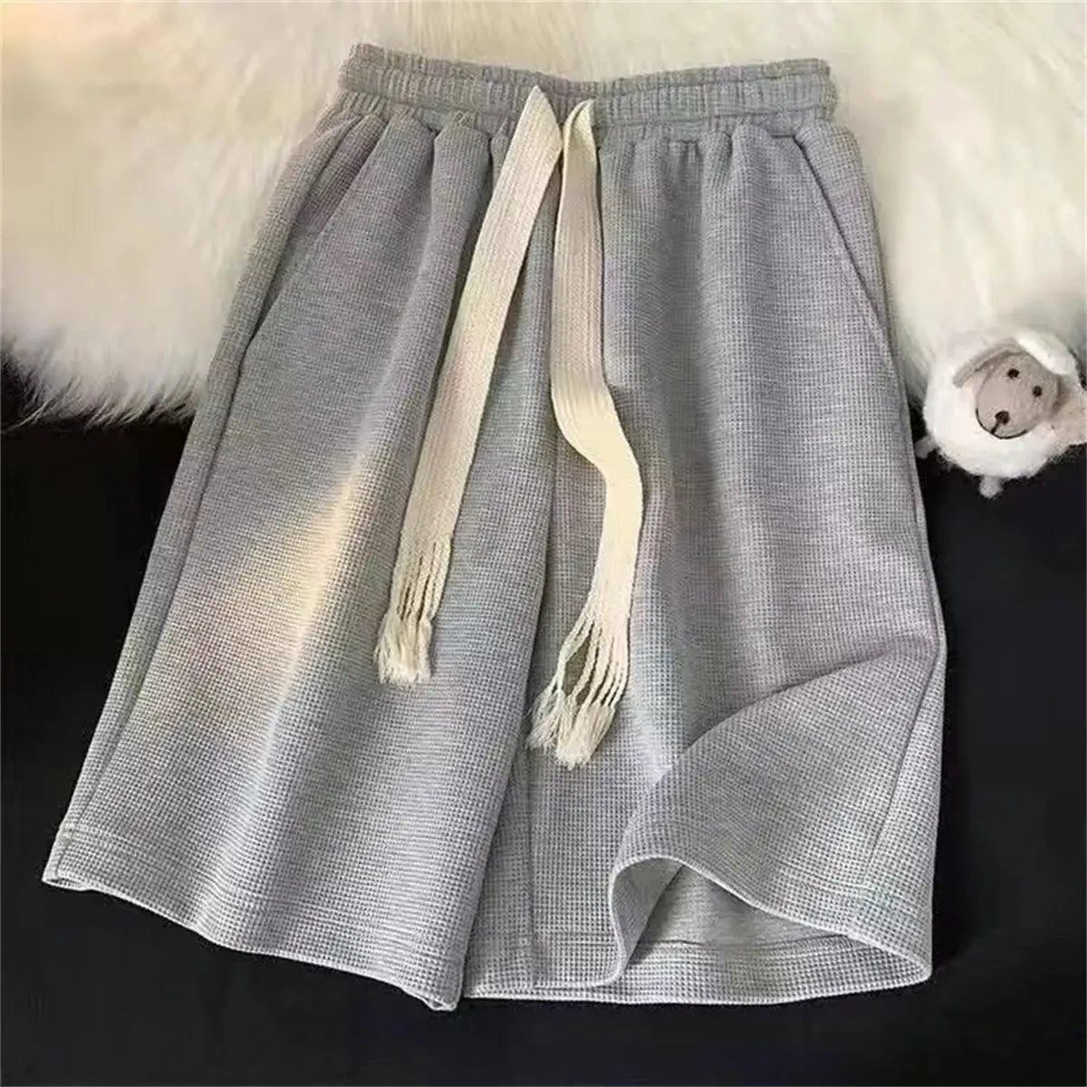 Simples Market men's grey breathable shorts with white drawstring, lightweight athletic wear
