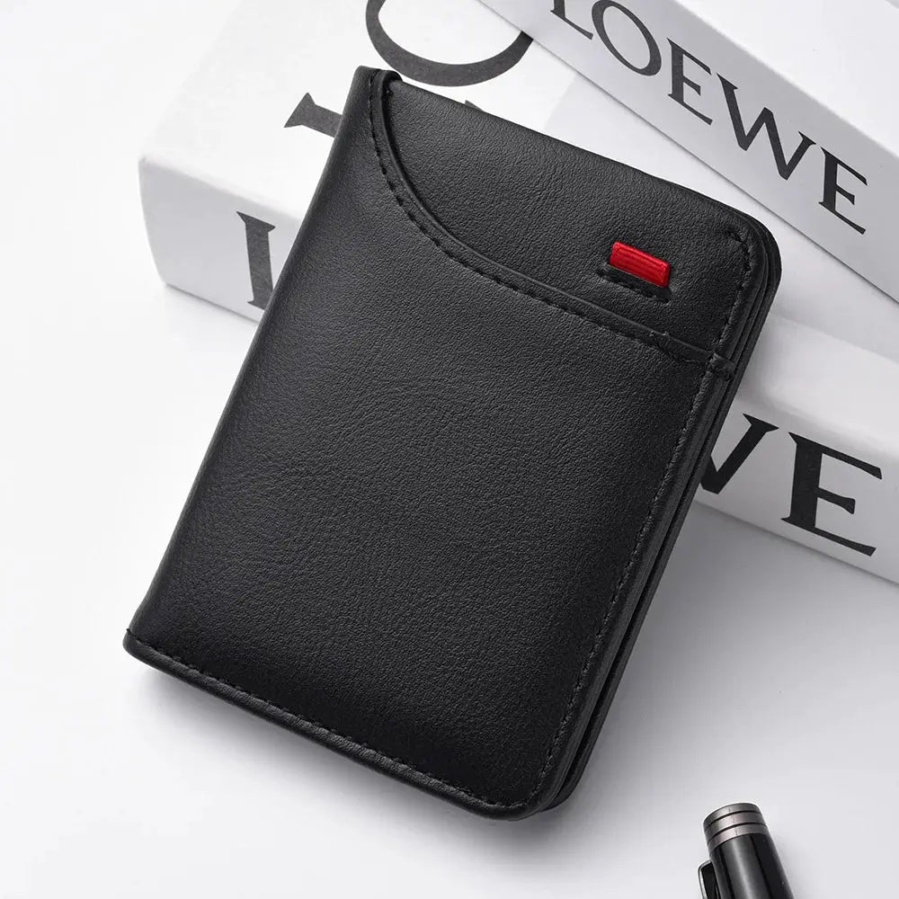 Black vertical leather wallet with curved top edge and red accent tab, compact card holder