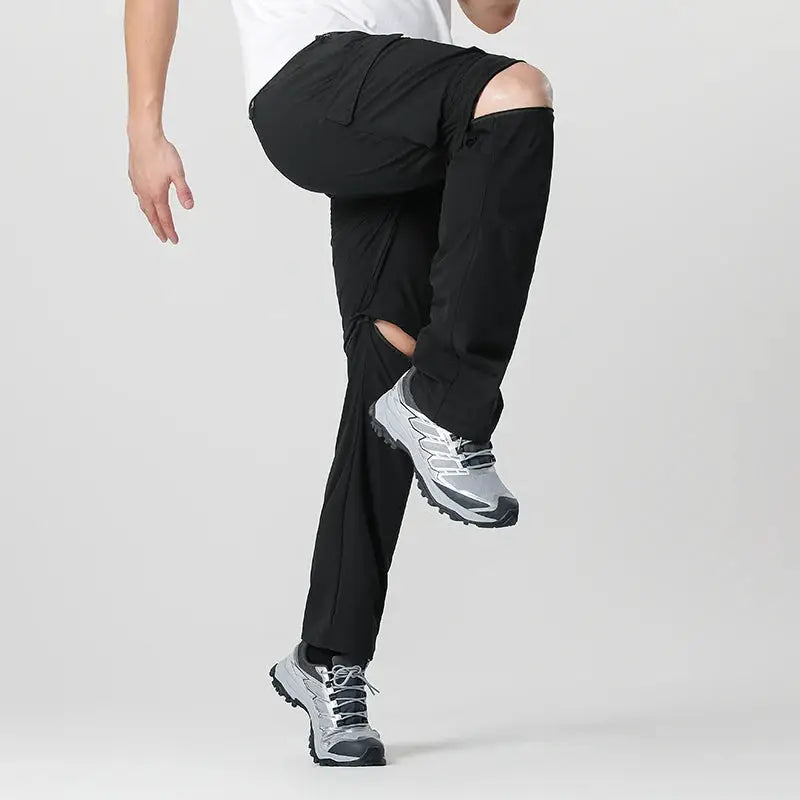 Men's cargo hiking convertible pants, black with zip-off legs for outdoor adventures.