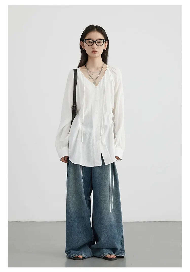 CHIC VEN white loose lace-up shirt with V-neck and long sleeves, paired with wide-leg denim
