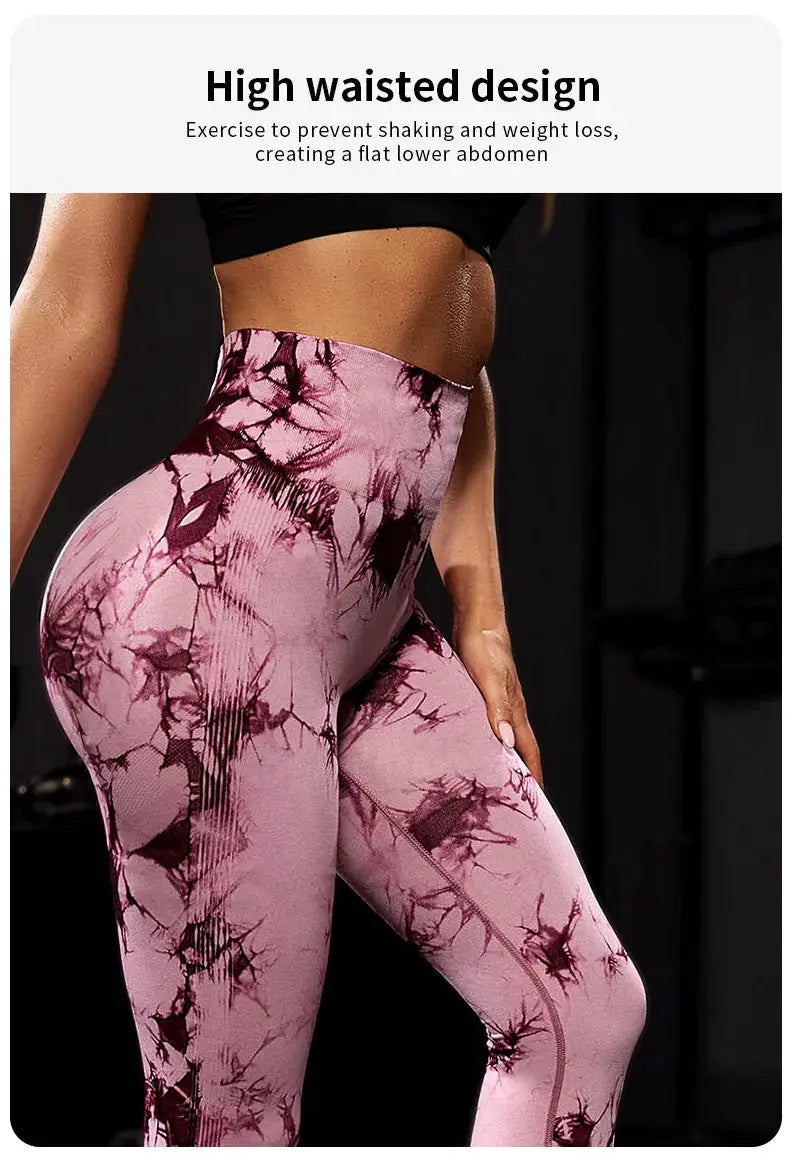 Women's pink tie-dye high-waisted leggings, nine-tenths length, soft stretchy breathable workout pants.