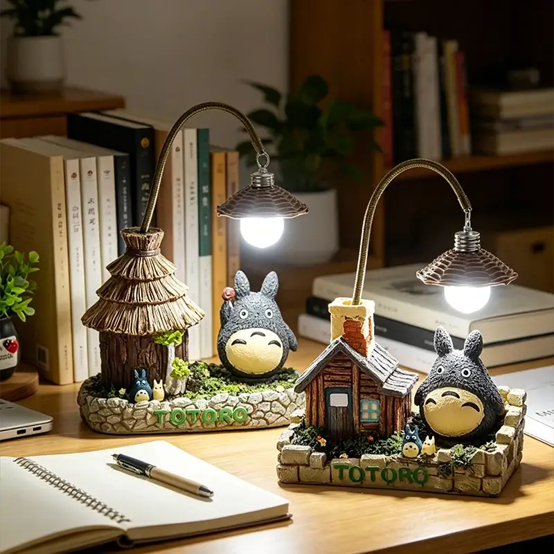 Set of two Totoro LED desk lamps with bulb-lit shades and whimsical cottage bases.