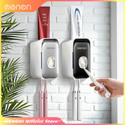 MENGNI toothpaste dispenser and toothbrush holder wall-mounted, two units in silver and black, manual operation.
