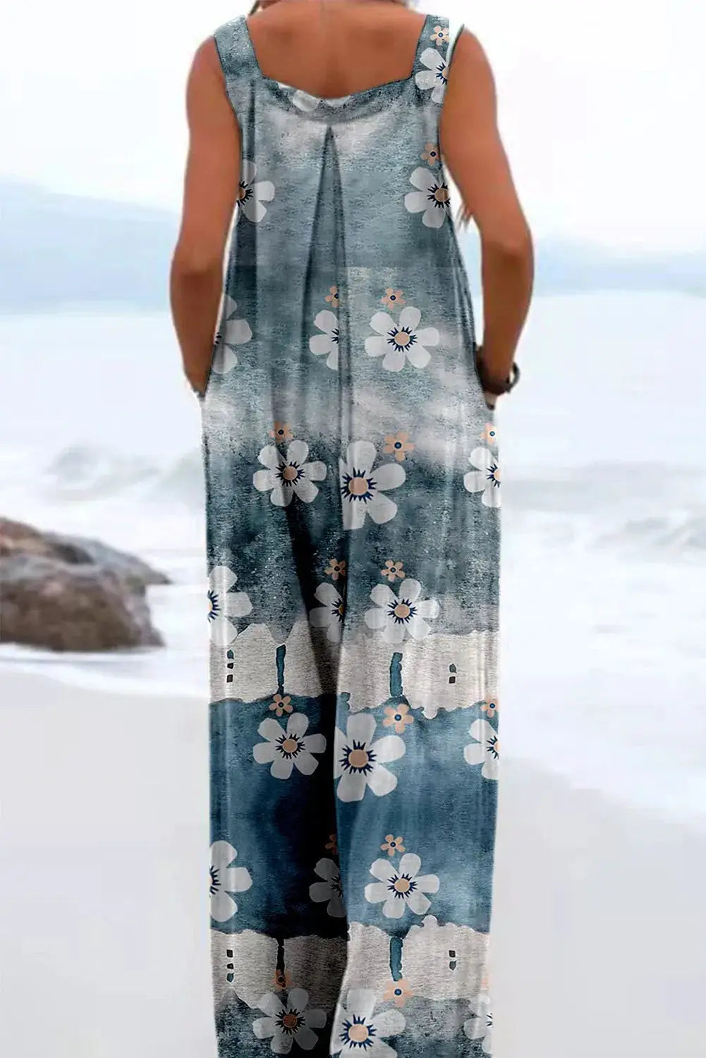 Vintage Print Buttons Sleeveless Jumpsuit for Women in blue floral print, loose wide-leg fit.