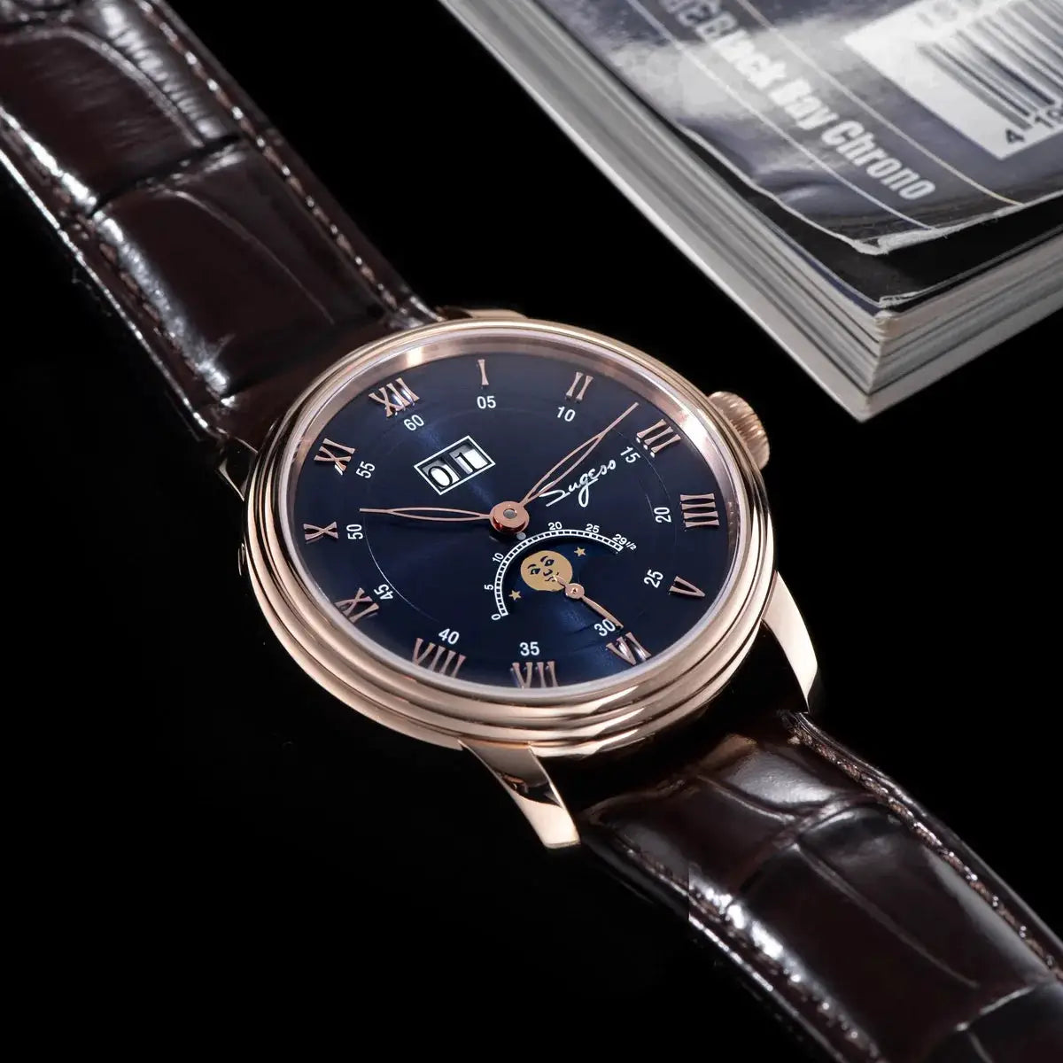 Sugess Moonphase men's watch with blue dial, moonphase indicator, rose-gold case, brown leather strap