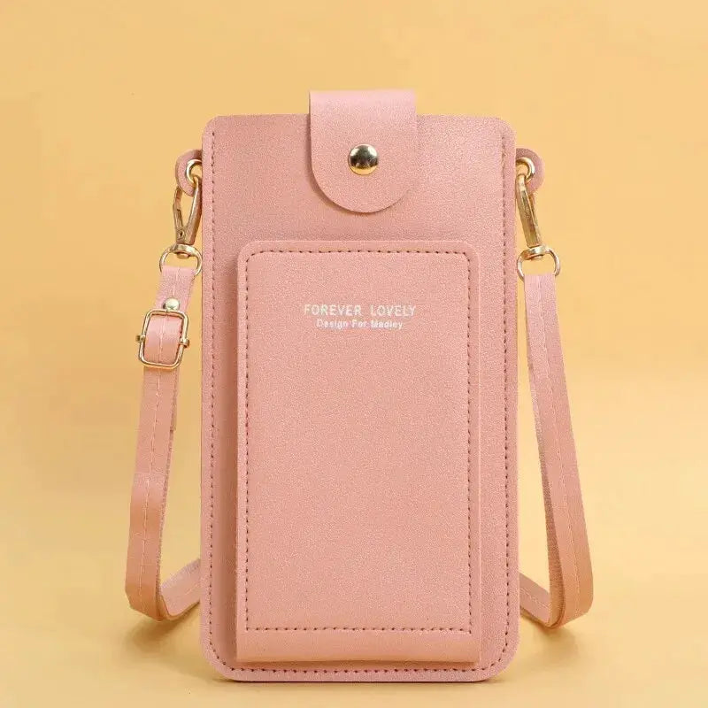 Pink soft leather crossbody phone purse by Simples Market with front pocket and adjustable strap