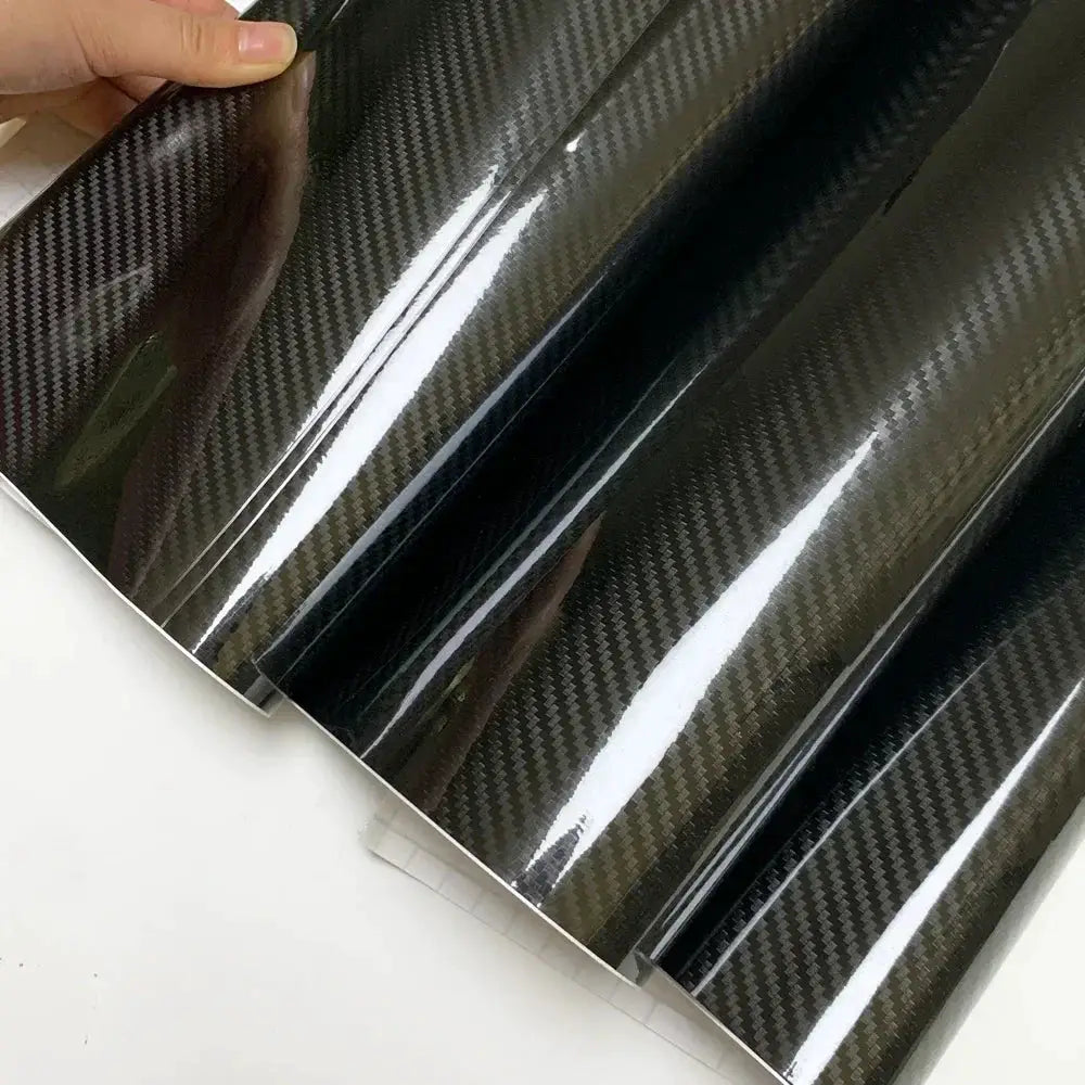 Simples Market carbon fiber wrap rolls in glossy black, waterproof car and motorcycle adhesive vinyl.