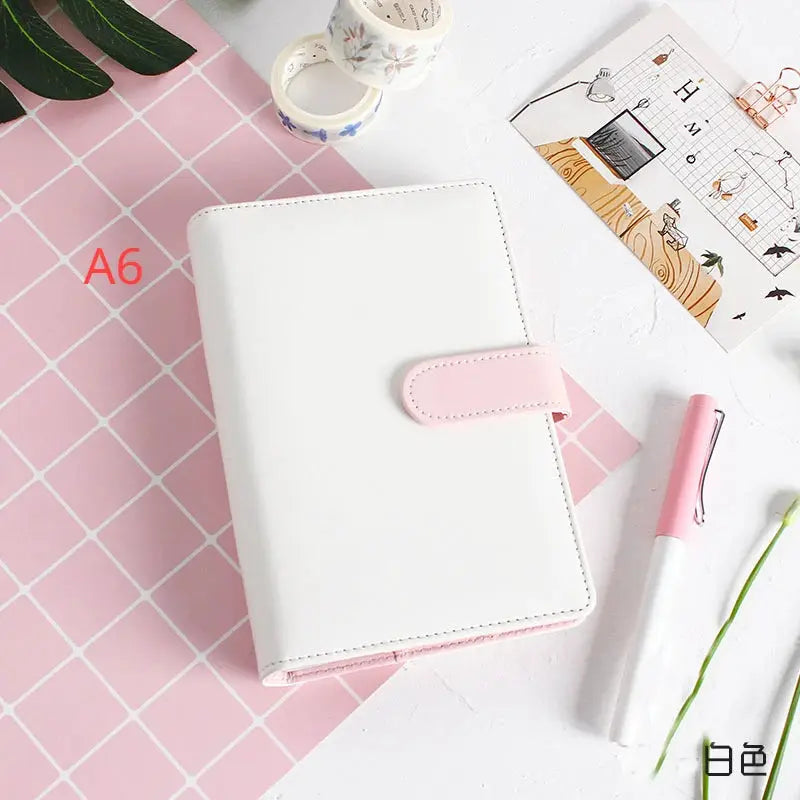 Notebook cover by Simples Market: white leather with pink strap, A6 size