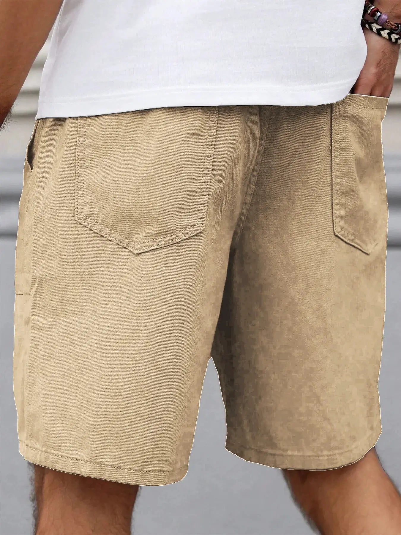 Simples Market men's tan mid-length shorts with back pockets, casual solid-color design.