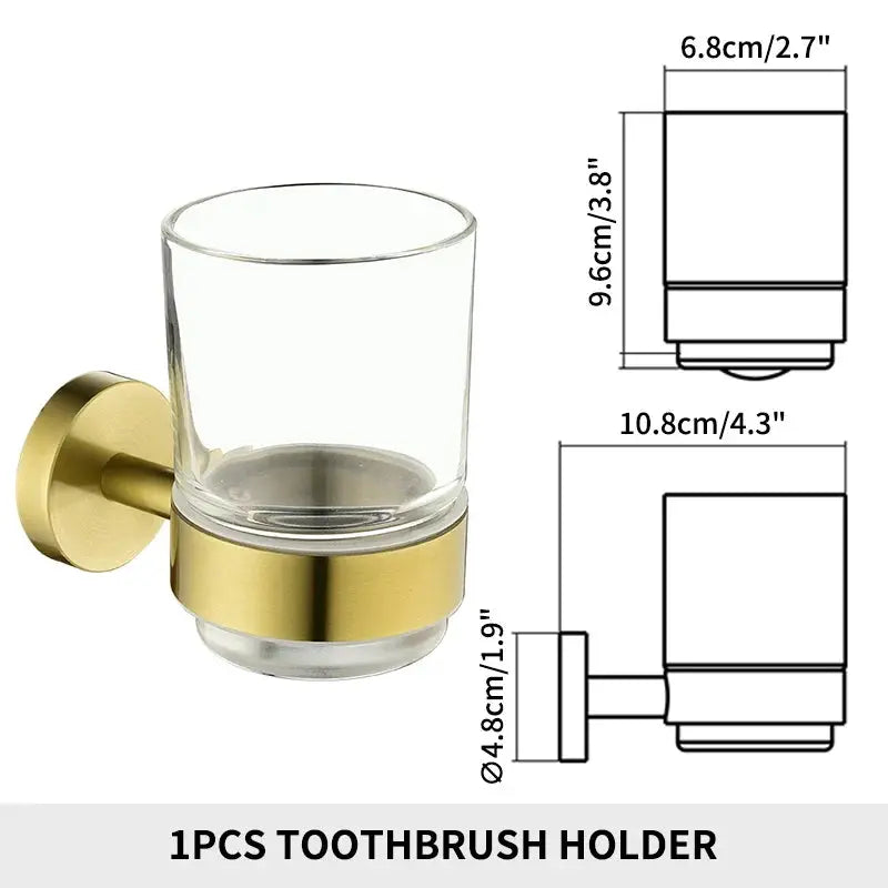 Toothbrush holder in brushed gold with clear glass tumbler, wall-mounted by Simples Market