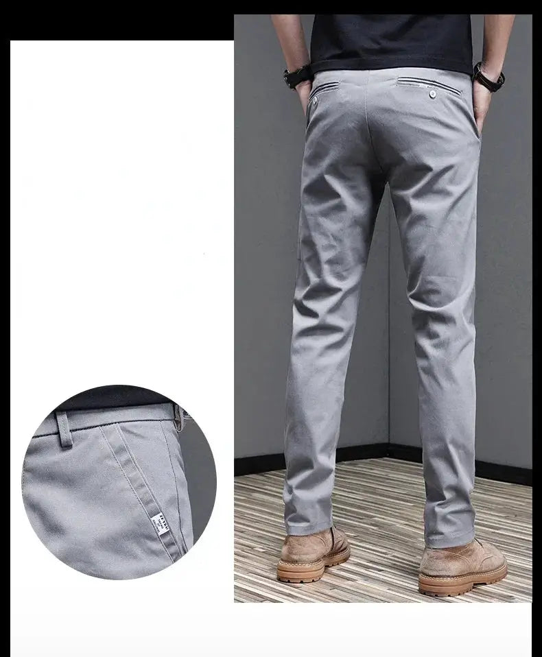 Men's gray slim-fit casual trousers with belt loops and back pocket button