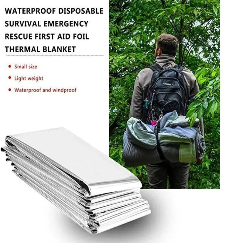 Mylar emergency thermal blankets pack; folded silver foil blankets for outdoor survival with hiker backpack