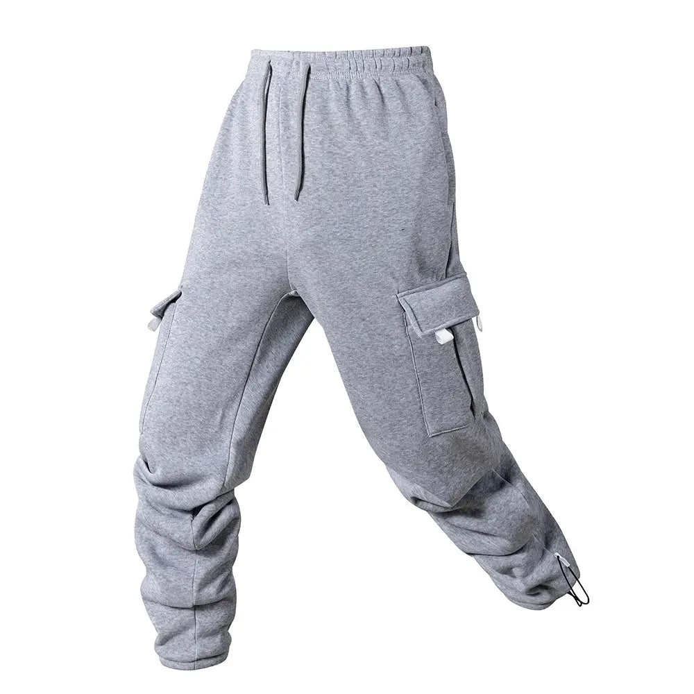 Men's grey cargo jogger pants with drawstring waist and multiple pockets