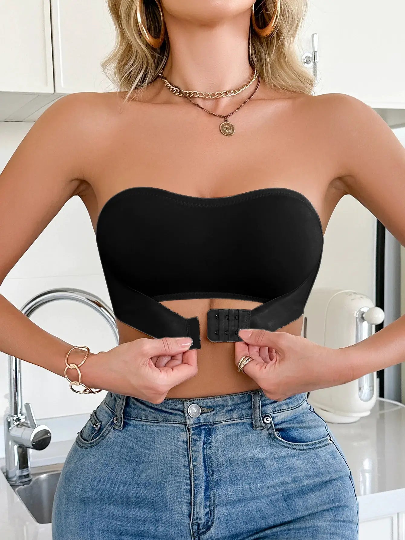 Strapless black wireless bralette with front-clasp closure