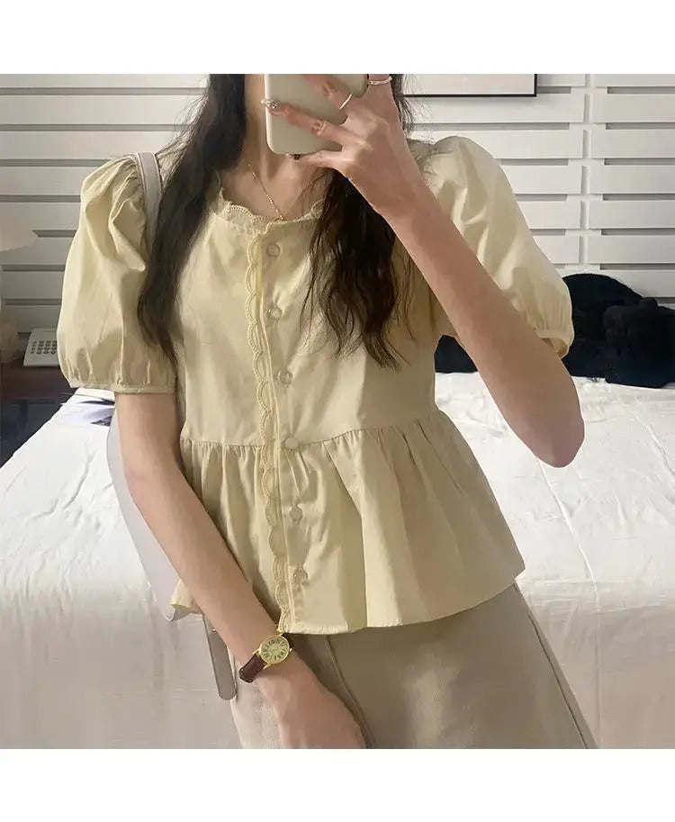 Women’s beige short puff-sleeve peplum shirt with scalloped front by Simples Market