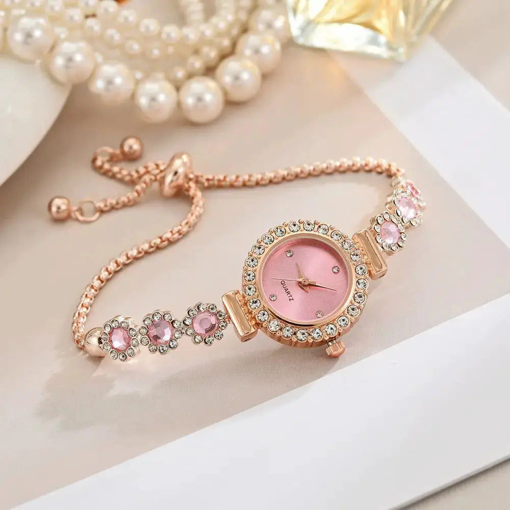 Women's rose-gold quartz wristwatch with pink dial and diamond-flower bracelet by Simples Market