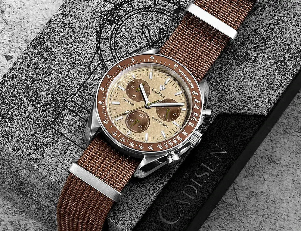 CADISEN men's quartz chronograph watch with beige dial, brown subdials, tachymeter bezel, steel case, brown canvas strap