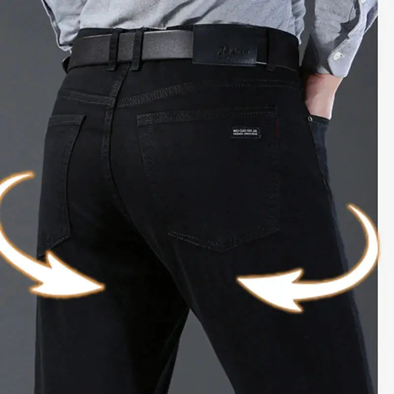 Men's black denim jeans, rear view showing back pockets and belt, slim straight fit