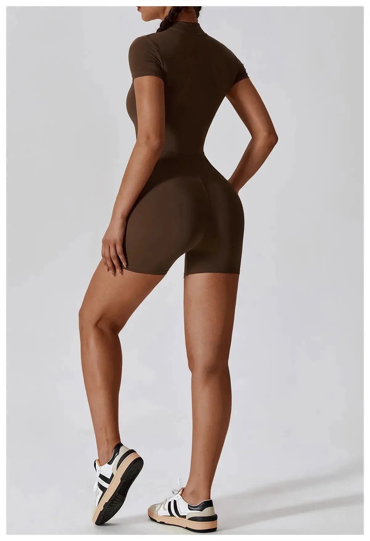 Women's brown zipper short-sleeve yoga jumpsuit by Simples Market; tight-fit, quick-dry fabric