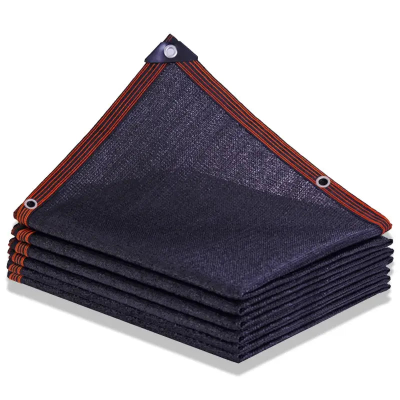 Simples Market sunshade net; blue/black HDPE garden shade with orange edging and grommets, folded stack