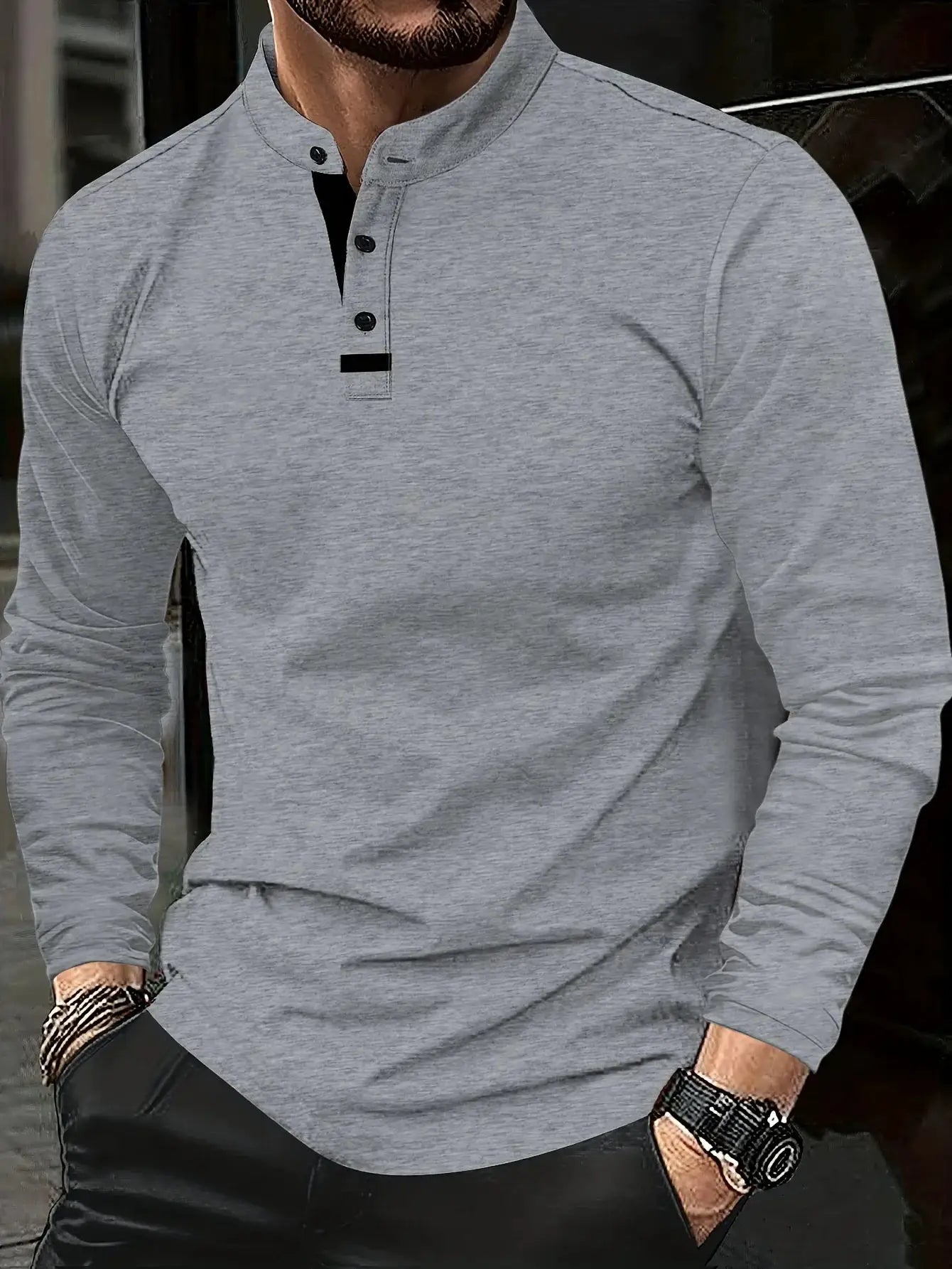 Men's grey heather round-neck polo shirt with button placket and long sleeves.