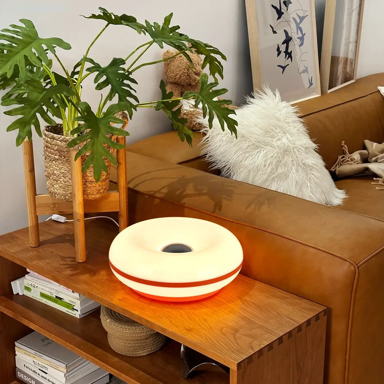 Simples Market Bauhaus donut table lamp; white with red stripe, USB plug, warm ambient light on wood coffee table