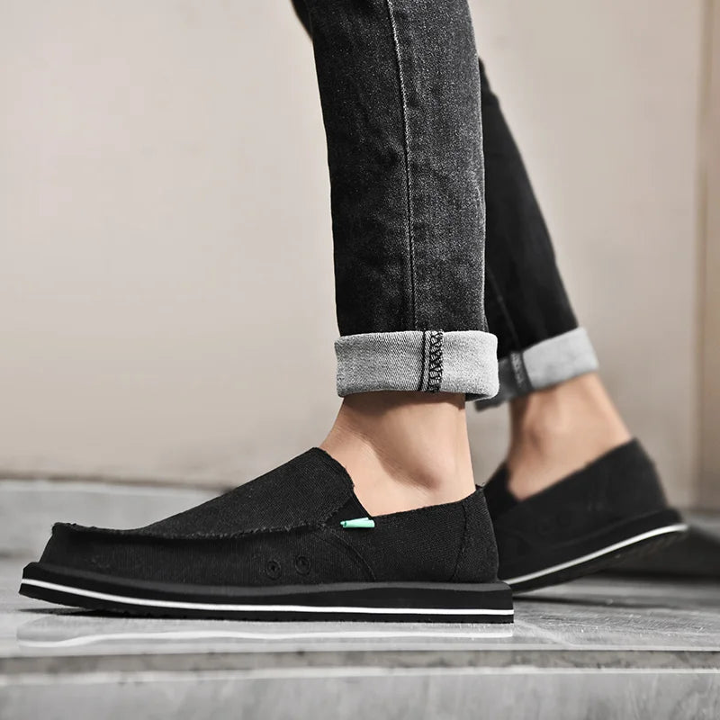 Simples Market men's black canvas loafers, breathable low-top casual shoes with white sole.