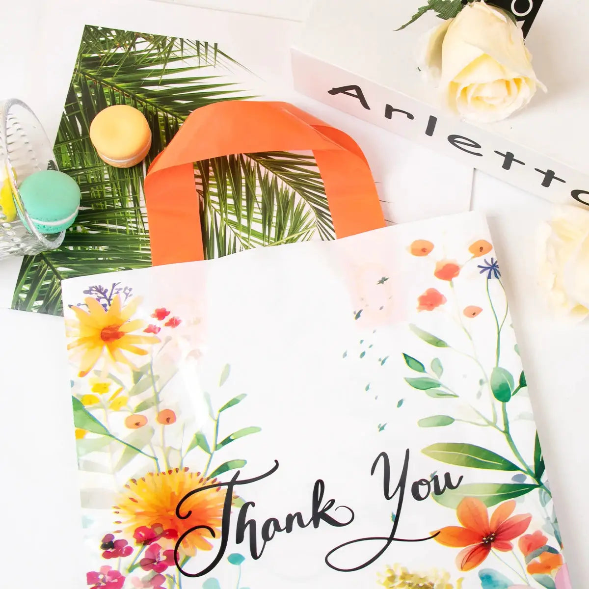 10-pack floral Thank You gift bags with orange handles; plastic tote bags for wedding favors and party gifts