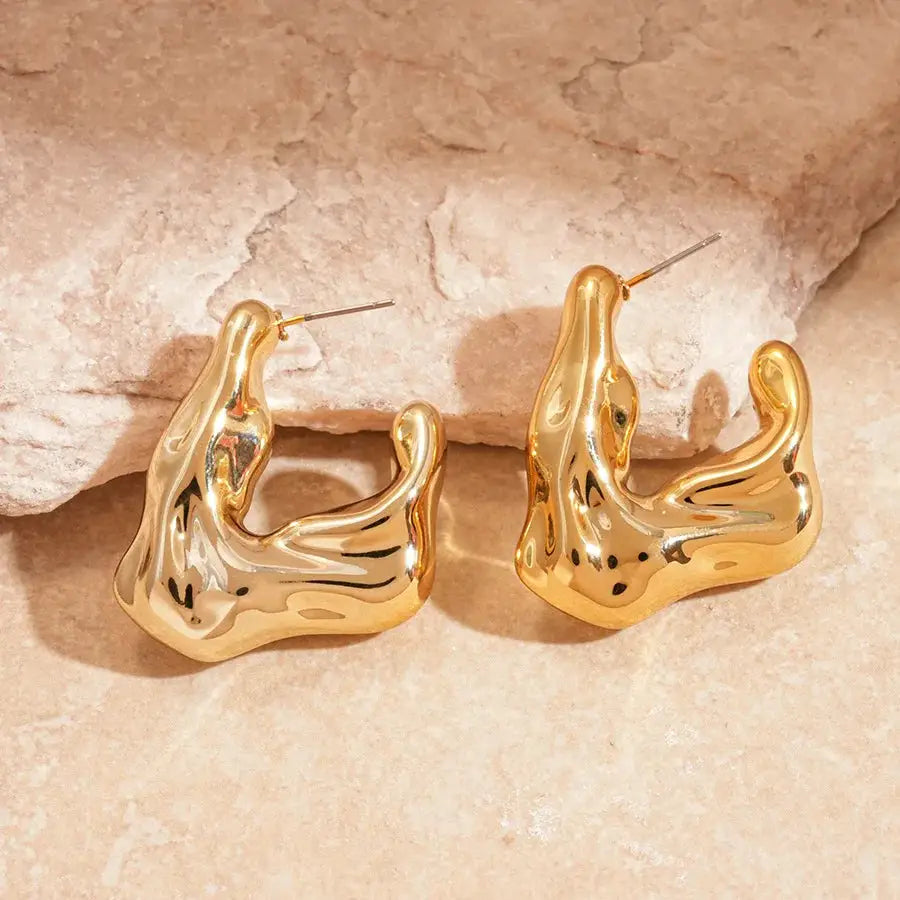Gold-tone irregular curved oval earrings; a unisex pair by Simples Market