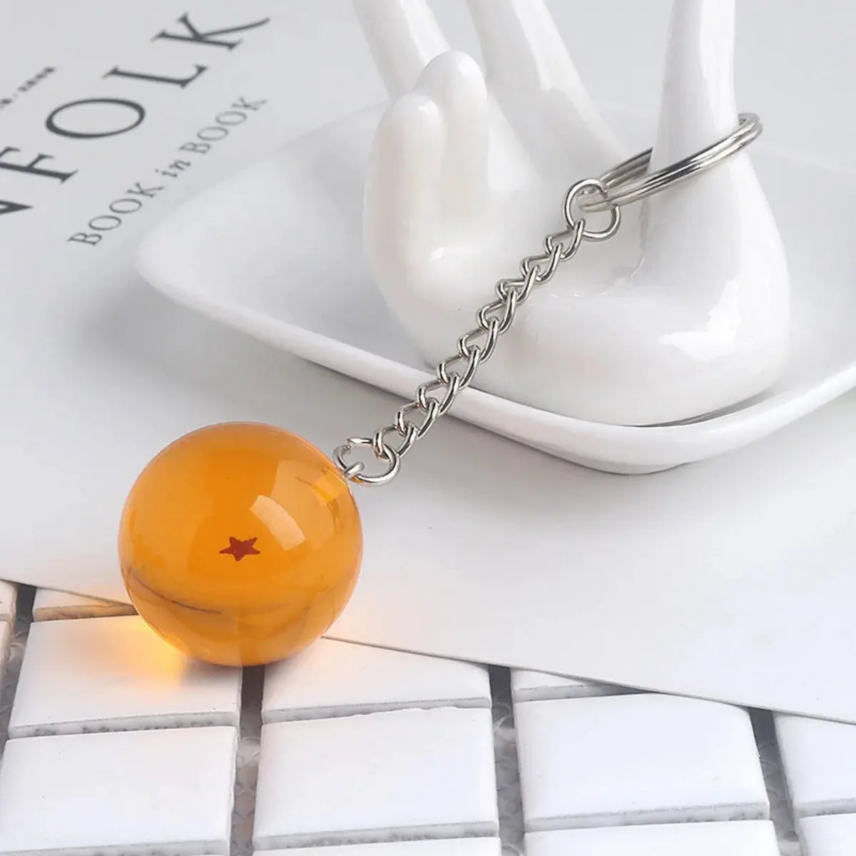 Dragon Ball keychain with orange bead and red star, metal chain and ring for bags and cars