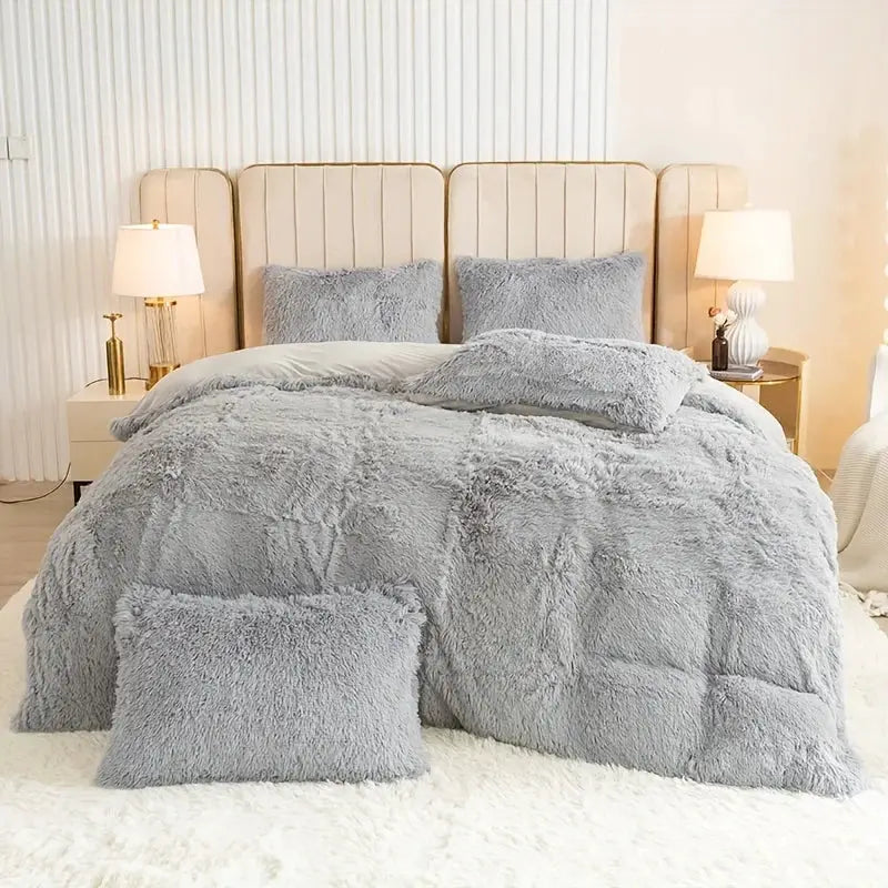 Simples Market 3-Piece Plush Duvet Cover Set in gray with fluffy comforter and two shams on a beige upholstered bed.