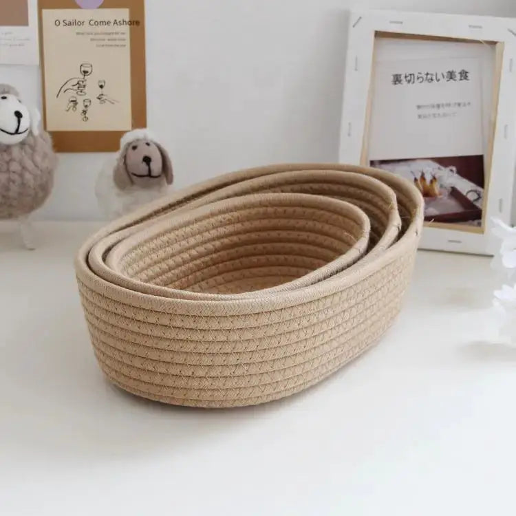 Set of 4 nested woven storage baskets in natural beige for desktop organization (cosmetics, sundries, toys)