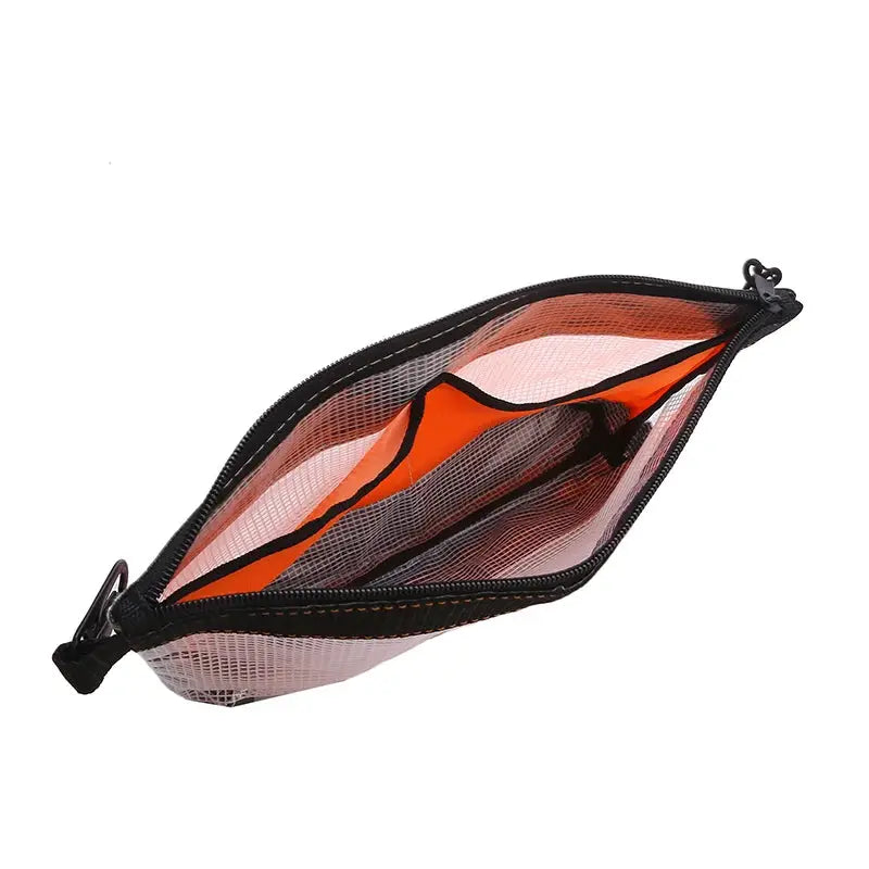 Transparent PVC waterproof organizer pouch by Simples Market with orange interior and multiple pockets.