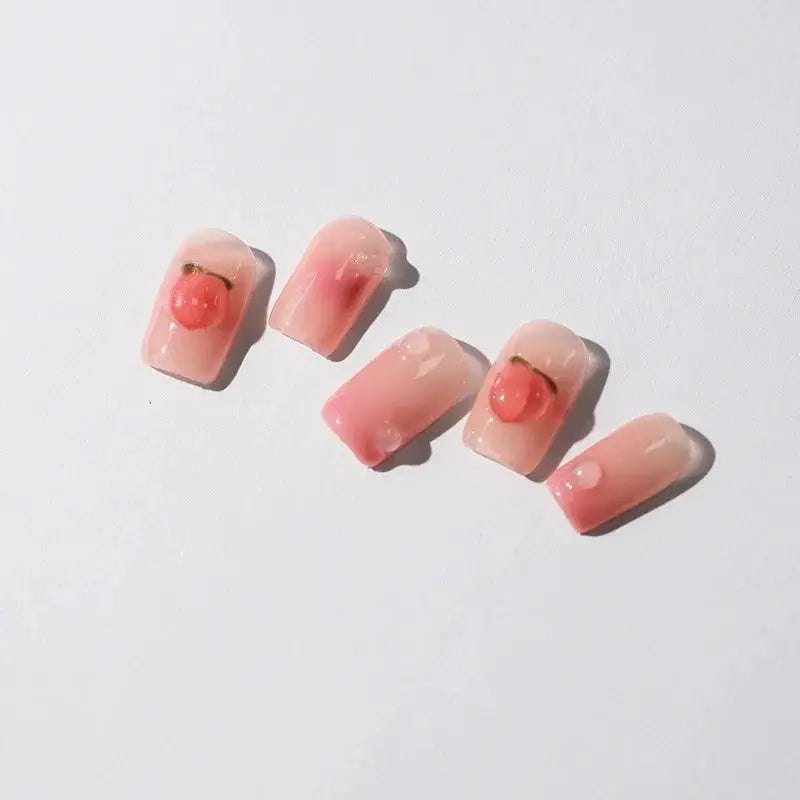 4-piece self-adhesive nail art decals, pink translucent peach jelly texture with 3D cherry reliefs, Simples Market