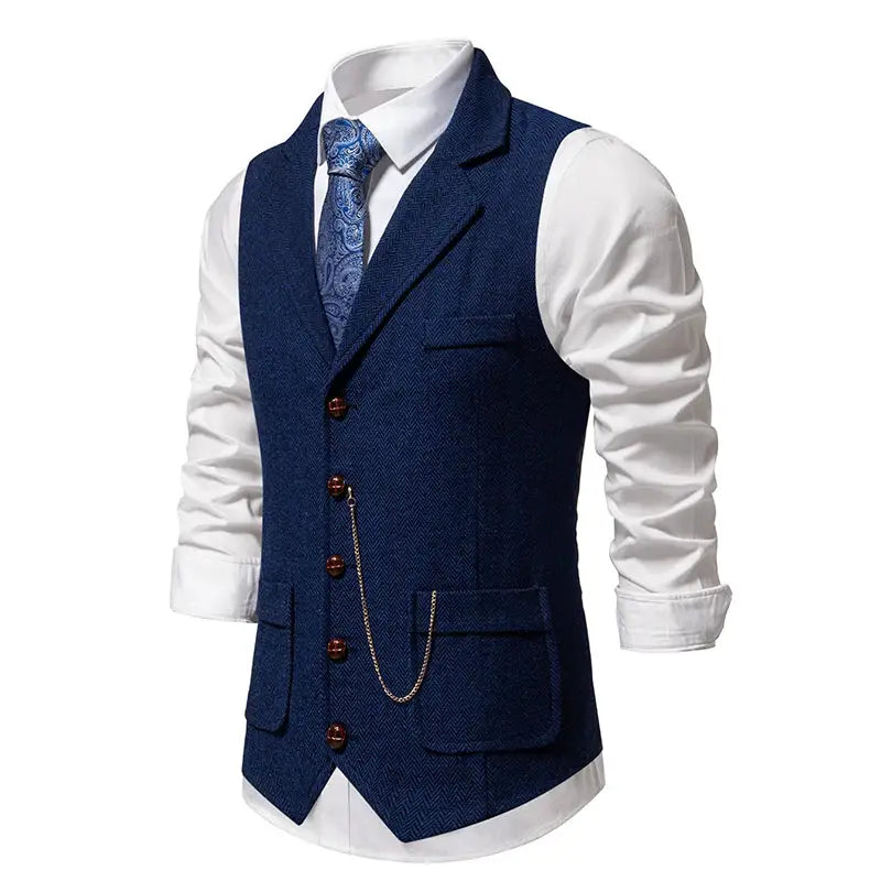 Men's navy blue tweed vest with herringbone pattern, button front, pocket flaps, and gold-tone chain.