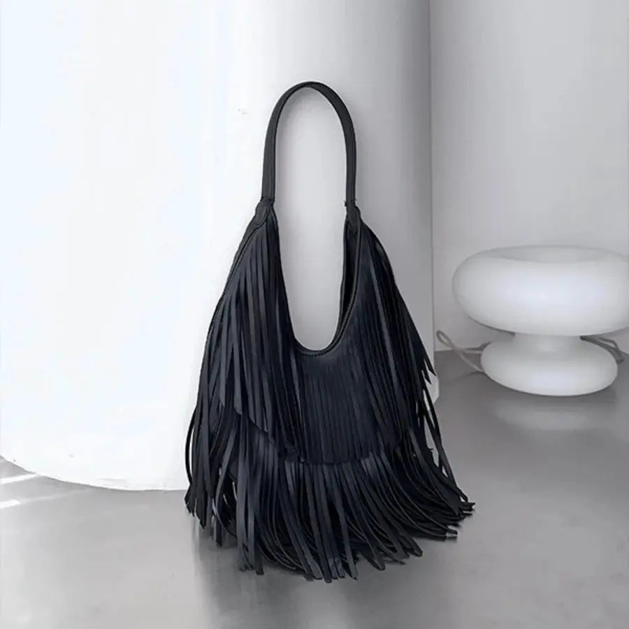 Long fringe tassel hobo handbag by Simples Market in black PU leather with a long shoulder strap