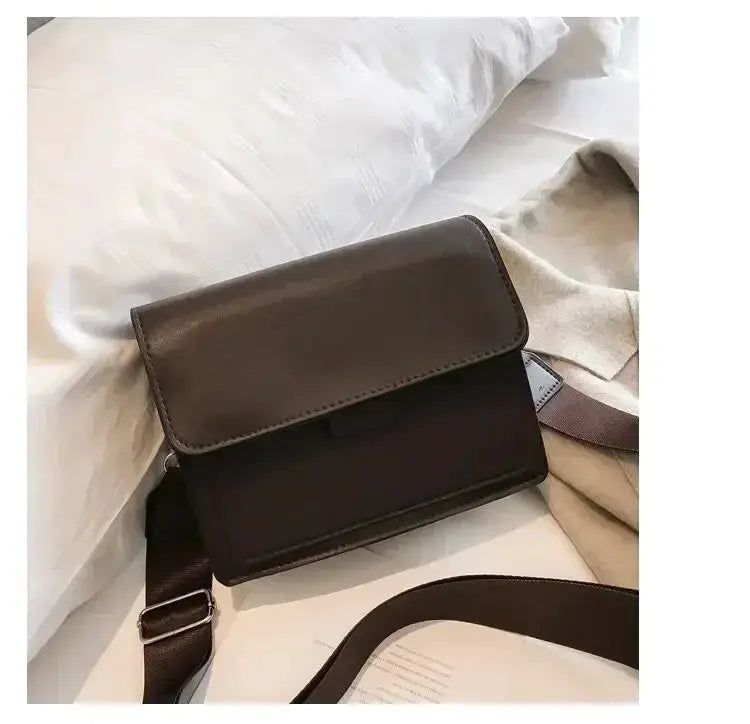 Women's brown PU leather crossbody bag with flap and adjustable strap