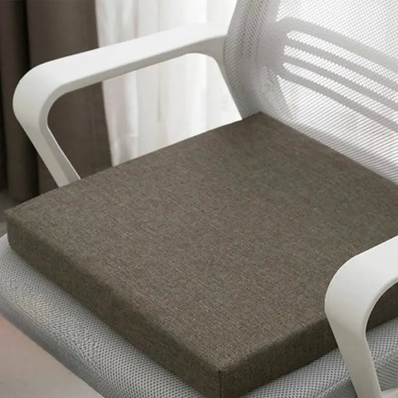 SRETNO natural latex chair cushion, brown thick seat pad placed on a white office chair.