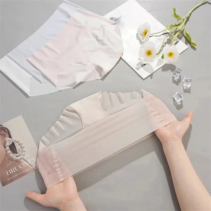 Ice Silk seamless underwear for women by Simples Market; two nude-pink and white quick-dry breathable panties