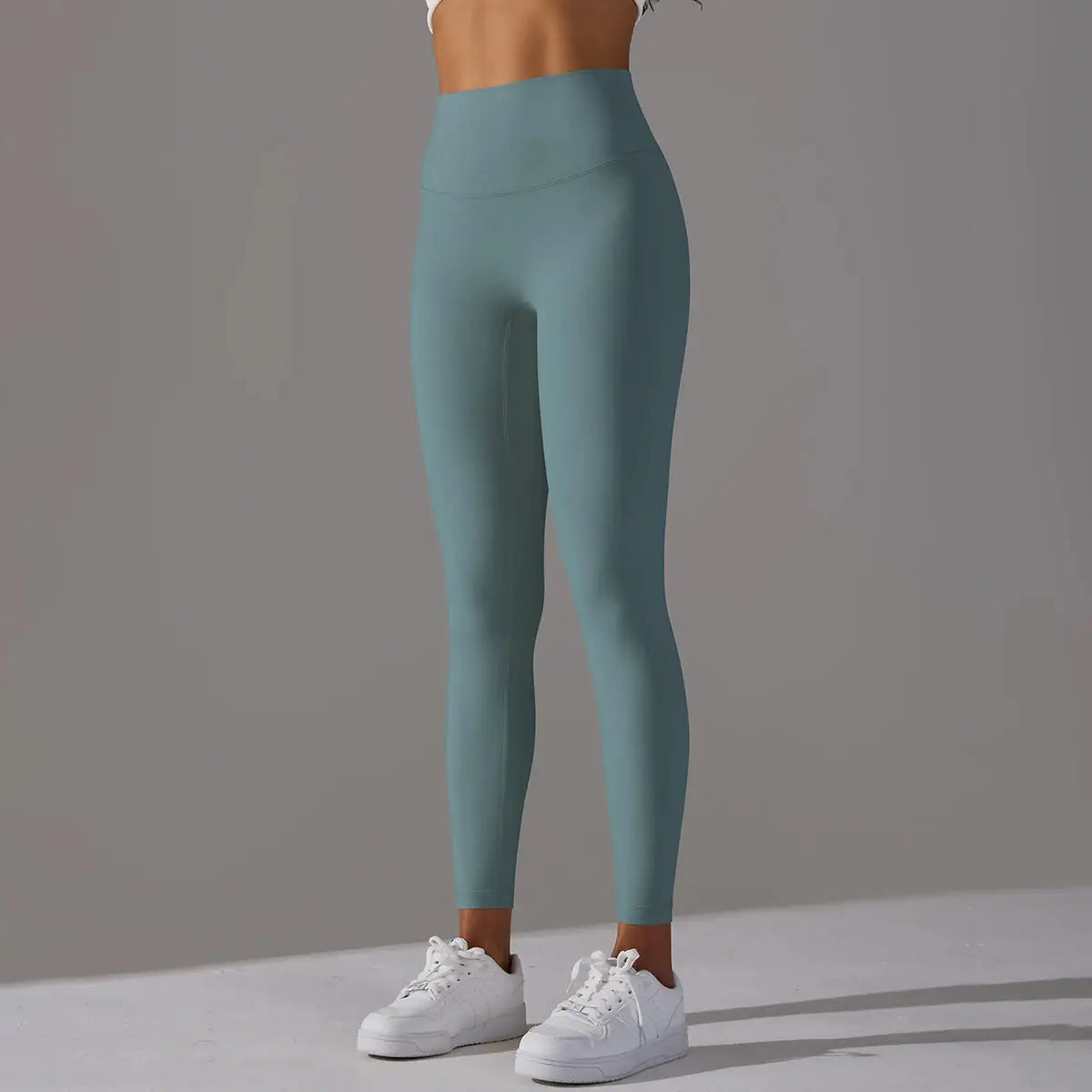 Naked Feeling high-waist leggings in teal for fitness, yoga and running by Simples Market