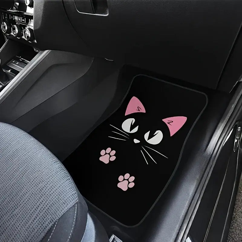 Car floor mat by Simples Market; black with pink cat face and paw prints, anti-skid, fits front and rear seats.