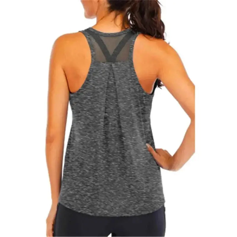 Women's grey heather yoga vest with loose-fit tank and mesh racerback